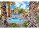 Beautiful pool and spa with palm trees and comfortable lounge area for relaxing and enjoying the outdoors at 7139 S Durango Dr # 218, Las Vegas, NV 89113