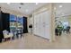 Eat-in kitchen with an adjacent dining area and built-in cabinets for storage at 8390 Carmel Ridge Ct, Las Vegas, NV 89113