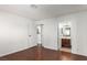 This bedroom features neutral walls and floors and a view of the bathroom at 338 Jett St # 101, Las Vegas, NV 89145