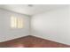 Clean bedroom with wood floors and bright window with natural light at 338 Jett St # 101, Las Vegas, NV 89145