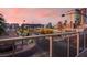 Balcony view overlooks a street scene with skyline in the distance at 353 E Bonneville Ave # 313, Las Vegas, NV 89101