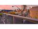 Wonderful balcony view overlooking downtown with streetlights, palm trees, and historical buildings at 353 E Bonneville Ave # 313, Las Vegas, NV 89101