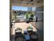 Balcony view overlooking the pool, with chairs and colorful pillows at 353 E Bonneville Ave # 313, Las Vegas, NV 89101