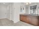 Elegant bathroom showcasing a double vanity with granite countertops and modern fixtures at 353 E Bonneville Ave # 313, Las Vegas, NV 89101