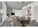 Bright dining area with modern chandelier and table set for dinner, and open-concept layout at 353 E Bonneville Ave # 313, Las Vegas, NV 89101