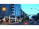 Modern condominium exterior with balconies and street view in an urban neighborhood at 353 E Bonneville Ave # 313, Las Vegas, NV 89101
