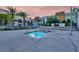Inviting hot tub area with comfortable seating and lush landscaping for relaxation at 353 E Bonneville Ave # 313, Las Vegas, NV 89101