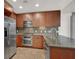 Modern kitchen with stainless steel appliances, granite counters, and plenty of cabinet space at 353 E Bonneville Ave # 313, Las Vegas, NV 89101