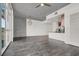 Spacious living room with modern flooring and large windows, seamlessly flowing into the kitchen at 353 E Bonneville Ave # 313, Las Vegas, NV 89101
