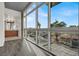 Bright living room featuring expansive windows, hardwood floors, and a sleek vanity at 353 E Bonneville Ave # 313, Las Vegas, NV 89101