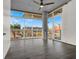 Spacious living room featuring hardwood floors, high ceilings, a column and large windows with a view at 353 E Bonneville Ave # 313, Las Vegas, NV 89101