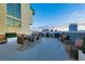 Relaxing rooftop deck with comfortable seating and panoramic city views at 353 E Bonneville Ave # 313, Las Vegas, NV 89101