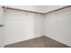 Well-organized walk-in closet with ample shelving and storage space at 353 E Bonneville Ave # 313, Las Vegas, NV 89101