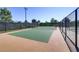 Well maintained tennis court with surrounding fence at 542 Celebratory Pl, Henderson, NV 89011