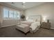 Spacious bedroom with plush bedding and plenty of natural light at 5864 Sky Ridge Falls Dr, Las Vegas, NV 89135