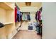 Walk-in closet with ample shelving and hanging space at 5911 Corbin Ave, Las Vegas, NV 89122