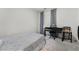 Cozy bedroom with a bed, desk, and window at 6271 Port Astoria Ct, Las Vegas, NV 89122