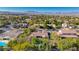 Aerial view of a house with a pool and a large backyard in a residential neighborhood at 10758 Chillingham Dr, Las Vegas, NV 89183