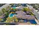 Aerial view of a house with a pool, spa and boat in the backyard at 10758 Chillingham Dr, Las Vegas, NV 89183