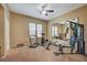 Well-equipped home gym with various exercise machines at 10758 Chillingham Dr, Las Vegas, NV 89183