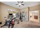 Home gym, equipped with exercise machines and mirror at 10758 Chillingham Dr, Las Vegas, NV 89183