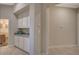 Convenient laundry area with built-in cabinets and countertop at 10758 Chillingham Dr, Las Vegas, NV 89183