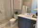 Elegant bathroom with a walk-in shower and modern vanity at 112 Antler Square Ln, Henderson, NV 89011