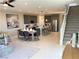 Open concept kitchen with island, dining area, and staircase at 112 Antler Square Ln, Henderson, NV 89011