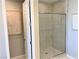 Modern shower with frameless glass enclosure at 112 Antler Square Ln, Henderson, NV 89011