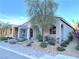 Single-story home with covered porch and landscaped yard at 36 Honeymoon Dr, Henderson, NV 89011