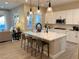 Modern kitchen with white cabinetry and large island at 36 Honeymoon Dr, Henderson, NV 89011