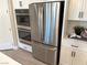 Stainless steel refrigerator and double oven in a modern kitchen at 36 Honeymoon Dr, Henderson, NV 89011