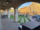 Spacious covered patio with mountain views and dining area at 36 Honeymoon Dr, Henderson, NV 89011