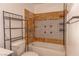 Well-lit bathroom with a tub-shower combo and tiled walls at 5409 Centurion Ct # 104, Las Vegas, NV 89122