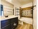 Elegant bathroom with a tub-shower combo and modern vanity with a large mirror at 5409 Centurion Ct # 104, Las Vegas, NV 89122