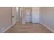 Bedroom with closet, baseboard trim and access to the hallway and other rooms at 5409 Centurion Ct # 104, Las Vegas, NV 89122