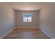 Bedroom features a window that provides plenty of natural light and new flooring at 5409 Centurion Ct # 104, Las Vegas, NV 89122