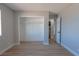 Bedroom with baseboard trim and open closet for storage at 5409 Centurion Ct # 104, Las Vegas, NV 89122