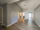 Spacious bedroom featuring hardwood floors and mirrored closet doors with lots of natural light at 5409 Centurion Ct # 104, Las Vegas, NV 89122