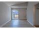 Bedroom with neutral walls, light-colored flooring and sliding glass door to a patio area at 5409 Centurion Ct # 104, Las Vegas, NV 89122