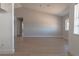 Bright living room with wood flooring, neutral walls and a vaulted ceiling at 5409 Centurion Ct # 104, Las Vegas, NV 89122