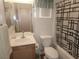 Clean bathroom with shower/tub combo and wood vanity at 6409 Sierra Diablo Ave, Las Vegas, NV 89130