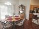 Charming dining area with a wood hutch and four chairs at 6409 Sierra Diablo Ave, Las Vegas, NV 89130