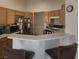 Kitchen with a breakfast bar and a view into the dining area at 6409 Sierra Diablo Ave, Las Vegas, NV 89130