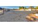 Vast, open lot ready for development, featuring a wide expanse and distant structures at 7320 Bath Dr, Las Vegas, NV 89131