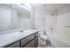 Clean bathroom with a vanity, mirror, and combined tub and shower at 8455 W Sahara Ave # 154, Las Vegas, NV 89117