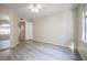 Bedroom featuring an arched window, ceiling fan, and mirrored closet at 8455 W Sahara Ave # 154, Las Vegas, NV 89117