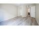 Bedroom featuring a mirrored closet and entry to hallway and attached bathroom at 8455 W Sahara Ave # 154, Las Vegas, NV 89117