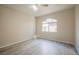 Bedroom featuring an arched window and ceiling fan at 8455 W Sahara Ave # 154, Las Vegas, NV 89117