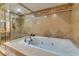 Spa-like bathroom with a large soaking tub and walk-in shower at 9103 Alta Dr # 701, Las Vegas, NV 89145